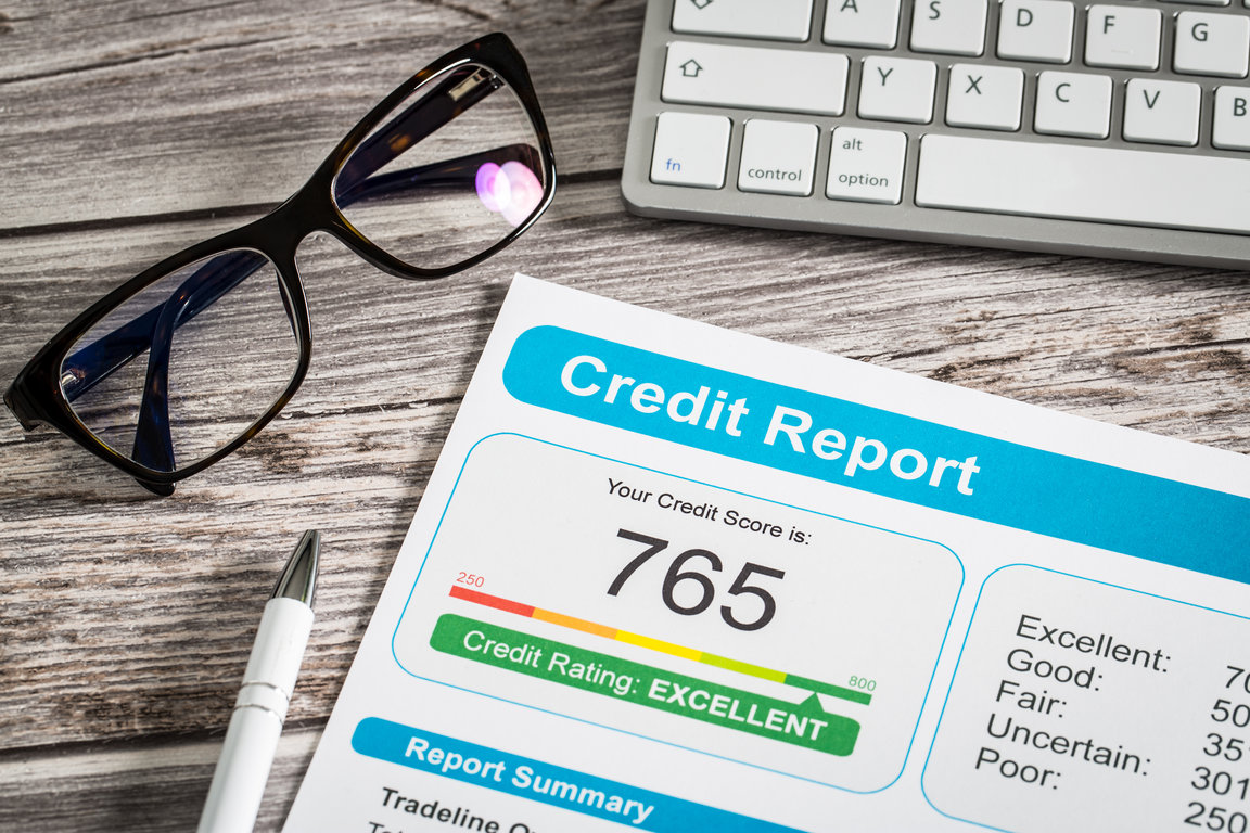 Credit report showing excellent 765 score demonstrating impact on auto loan rates and financing approval